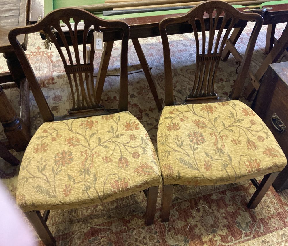 Four Georgian armchairs and a pair of standard chairs